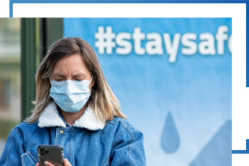 A woman wearing a mask