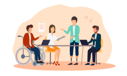 meeting of four people, one of them is a wheelchair user