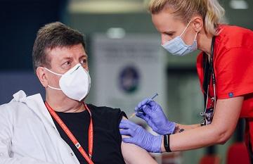 person being vaccinated