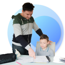 a father helping his son do his homework