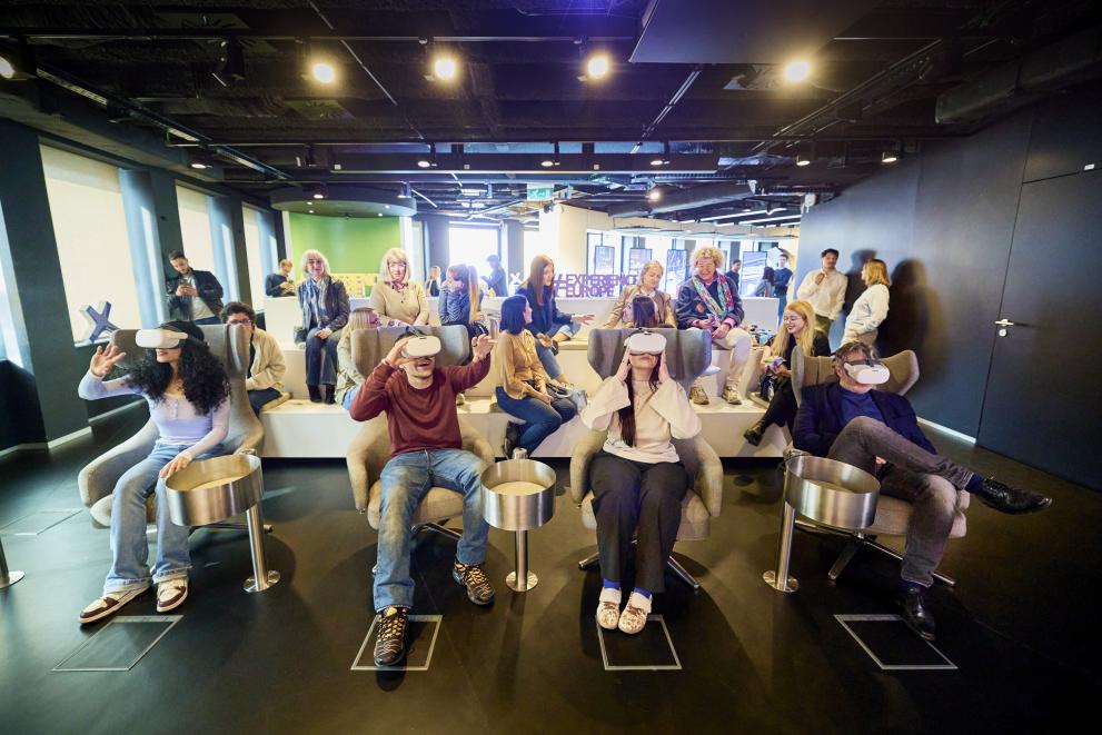 People using augmented reality devices at the Experience Europe exhibition