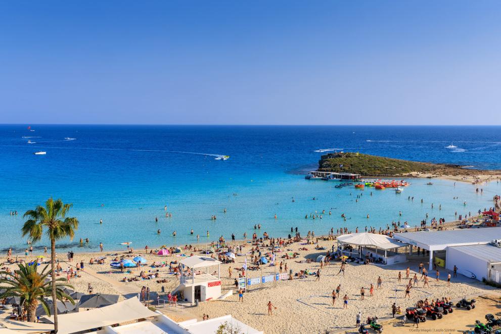Beach with people on in Cyprus