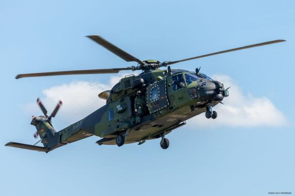German military transport helicopter NH 90 flying