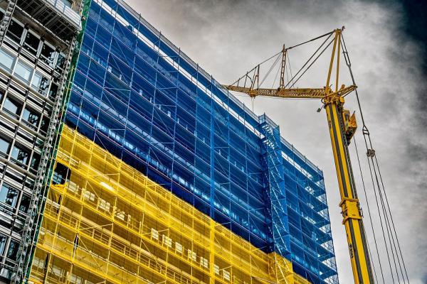 National colors of Ukraine as a symbol of reconstruction on a building in downtown Frankfurt